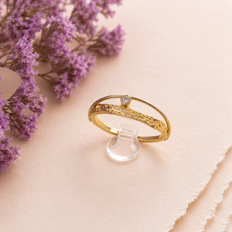 Grillige ring met boogje