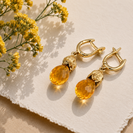 Oorsieraden koningskaars met citrien drops