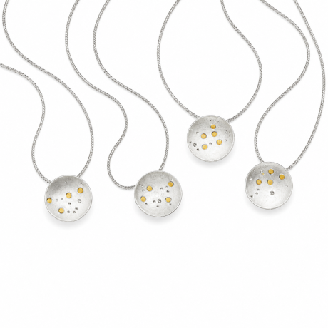 Zilver met gouden sterrenbeeldhanger