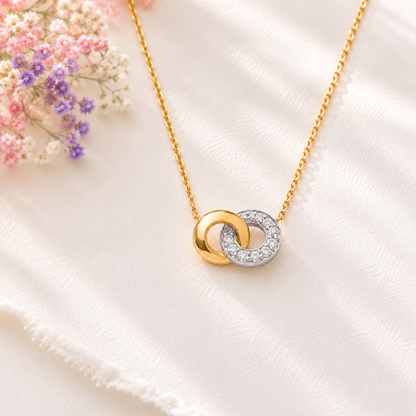 Bicolor collier met twee cirkels in elkaar met diamant