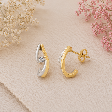 Bicolor oorringen met steker en diamant