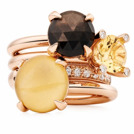 Bron ring Catch met bruine saffier