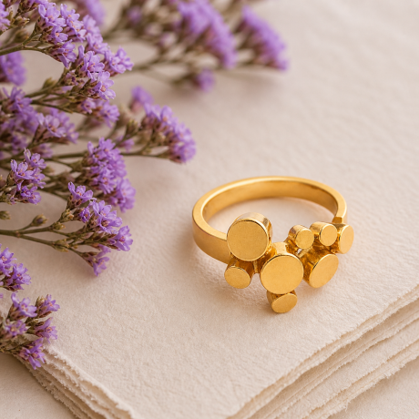 Geelgouden rondjes ring groot