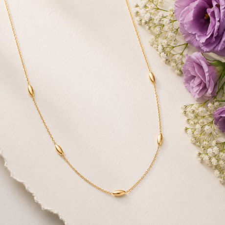 Geelgouden collier met graankorrel vormen
