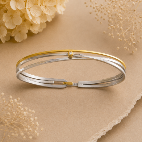 Zilveren wikkelarmband met goud