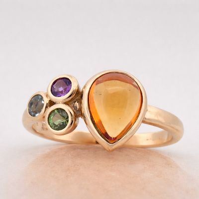 Geelgouden ring met citrien druppel en diverse edelstenen