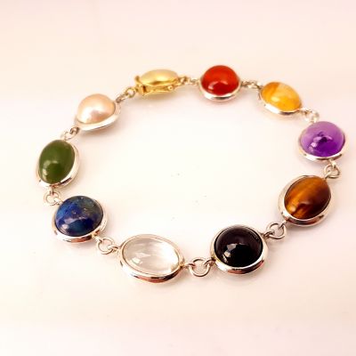 Zilver met gouden armband met diverse edelstenen