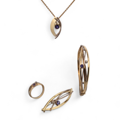 Bicolor wikkelset met tanzaniet van klant