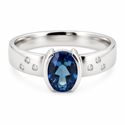 Witgouden ring met diamant en london blue topaas Zuurdeeg en Ockels