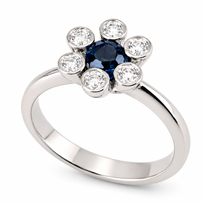 witgouden ring met diamant in bloemvorm Zuurdeeg en Ockels.