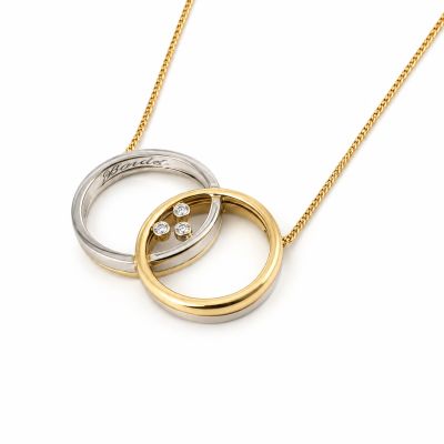 Gouden hanger met diamant gemaakt van bestaande relatie ringen